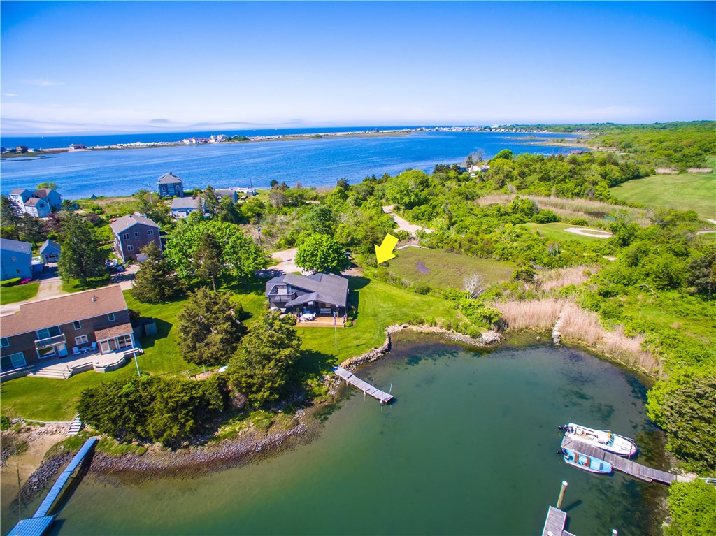 4 Shell Drive Westerly, RI 02891 - Photo 6 of 35 The 11th fairway of Winnapaug Country Club can be seen on the upper right hand side of this photo and Westerly Town Beach on the upper left.