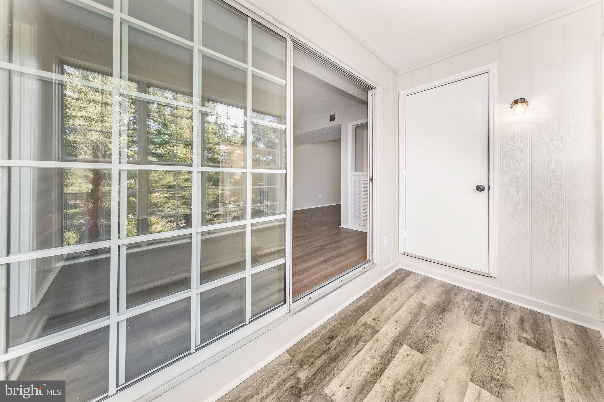 118 Fort Evans Road Southeast, Unit C Leesburg, VA 20175 - Photo 14 of 35 a view of a room with a large window