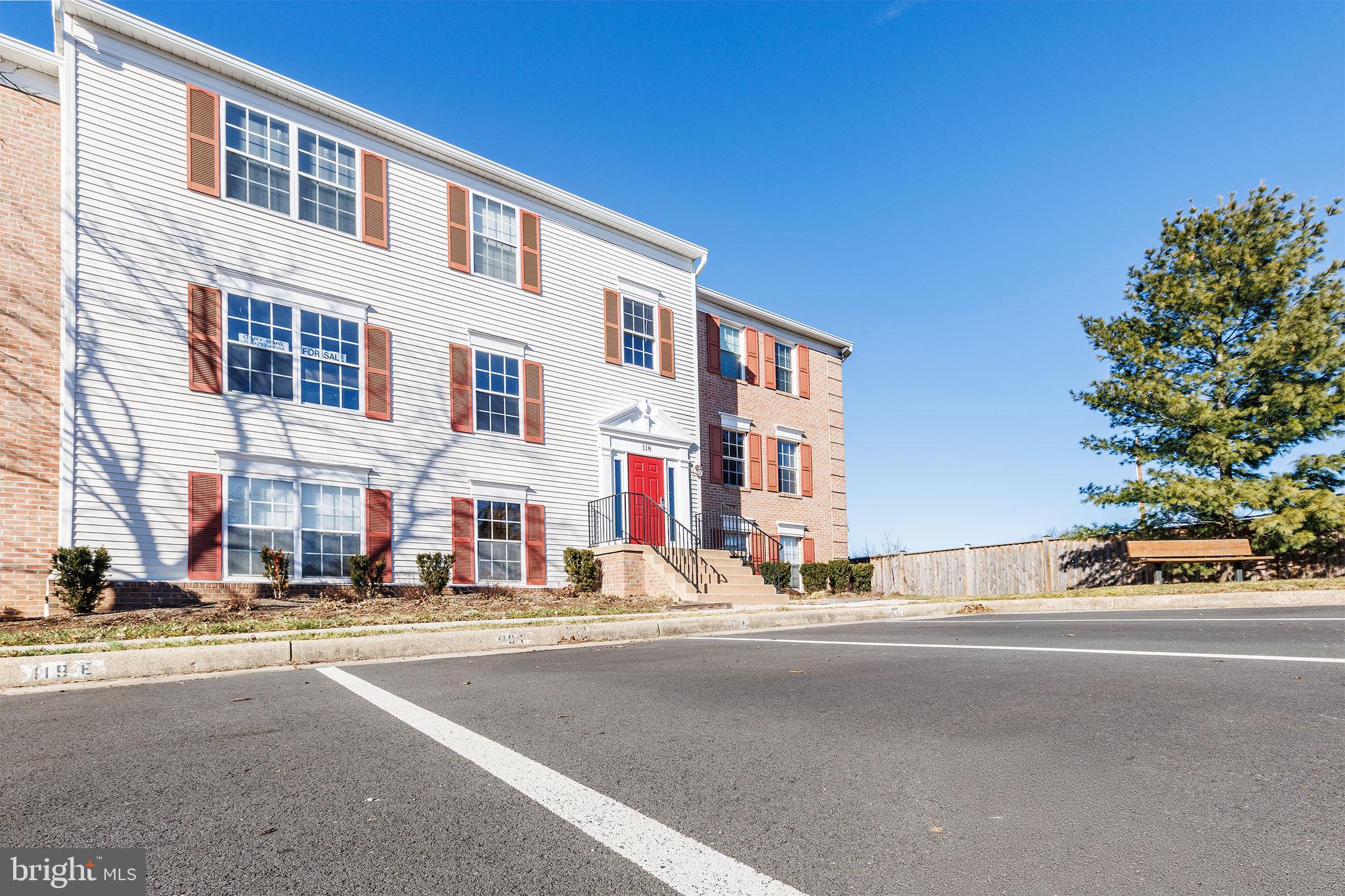 118 Fort Evans Road Southeast, Unit C Leesburg, VA 20175 - Photo 2 of 35 a view of a street with a building in the background