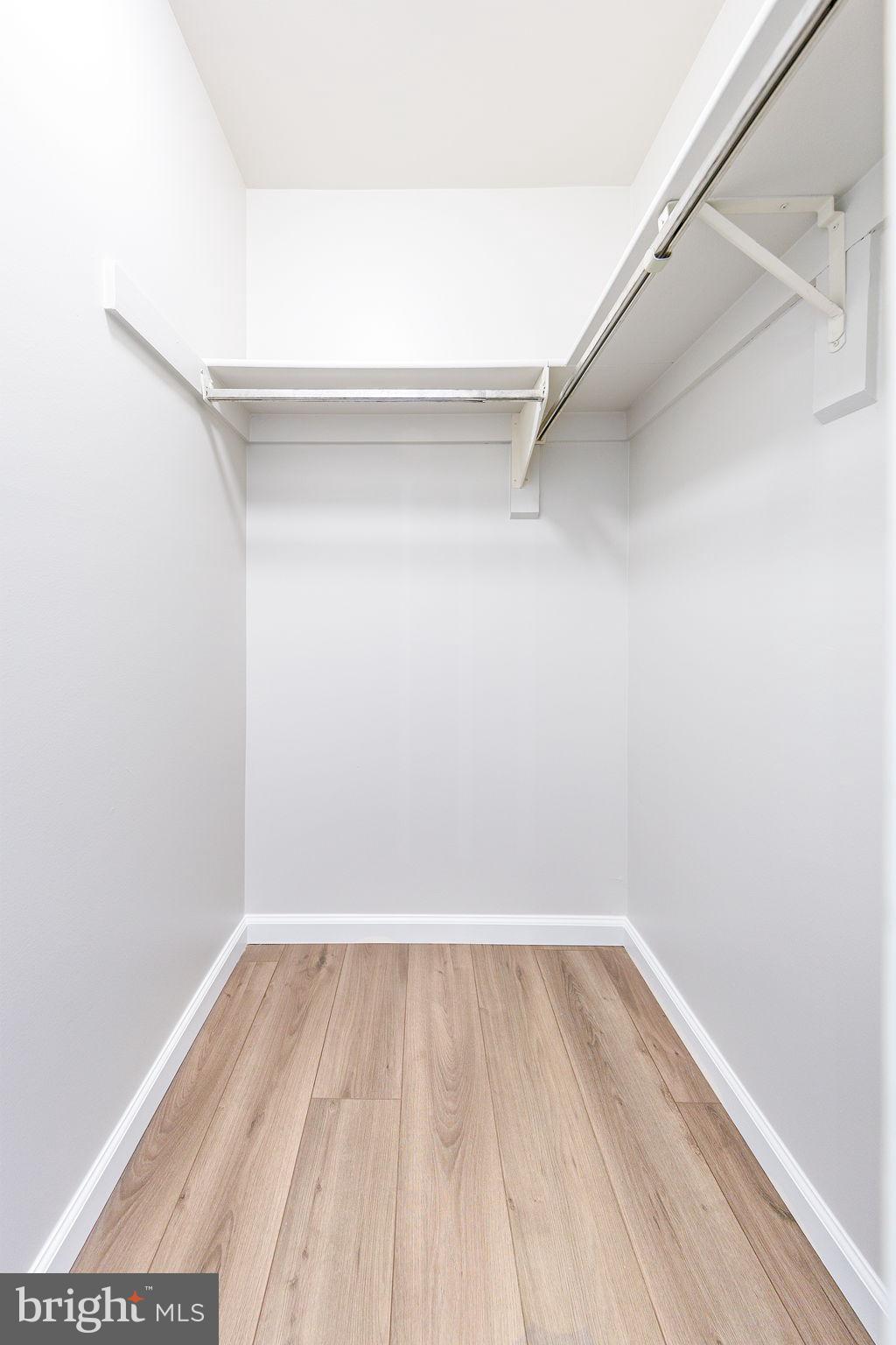 118 Fort Evans Road Southeast, Unit C Leesburg, VA 20175 - Photo 21 of 35 a view of a room with wooden floor