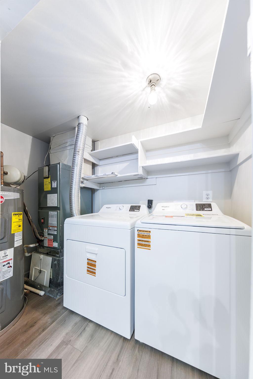 118 Fort Evans Road Southeast, Unit C Leesburg, VA 20175 - Photo 28 of 35 a utility room with dryer and washer