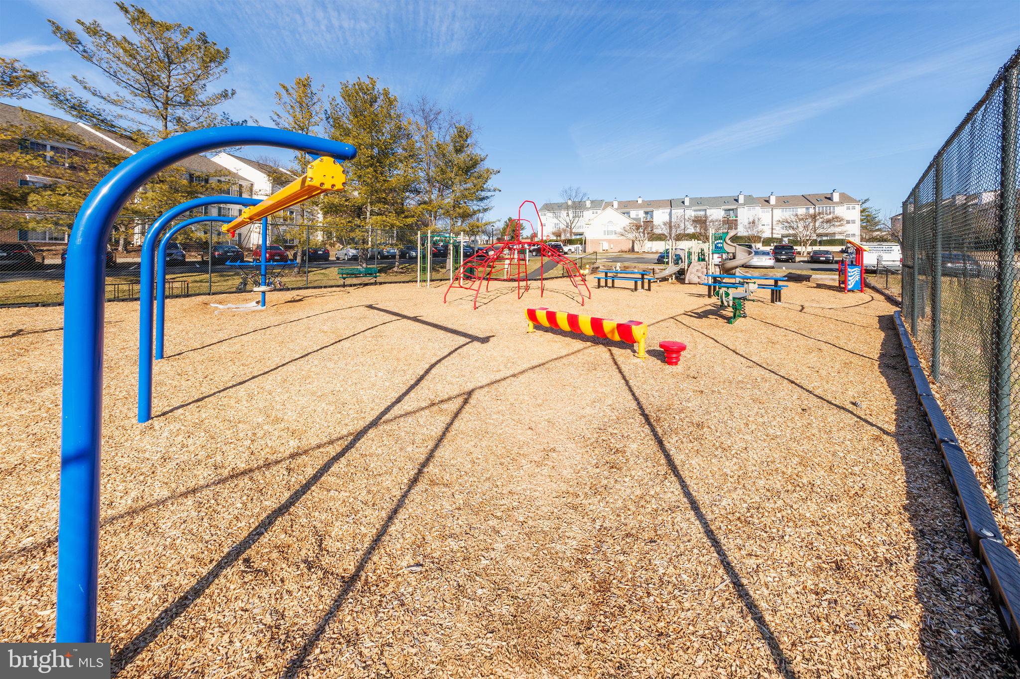 118 Fort Evans Road Southeast, Unit C Leesburg, VA 20175 - Photo 32 of 35 a view of swimming pool with a patio