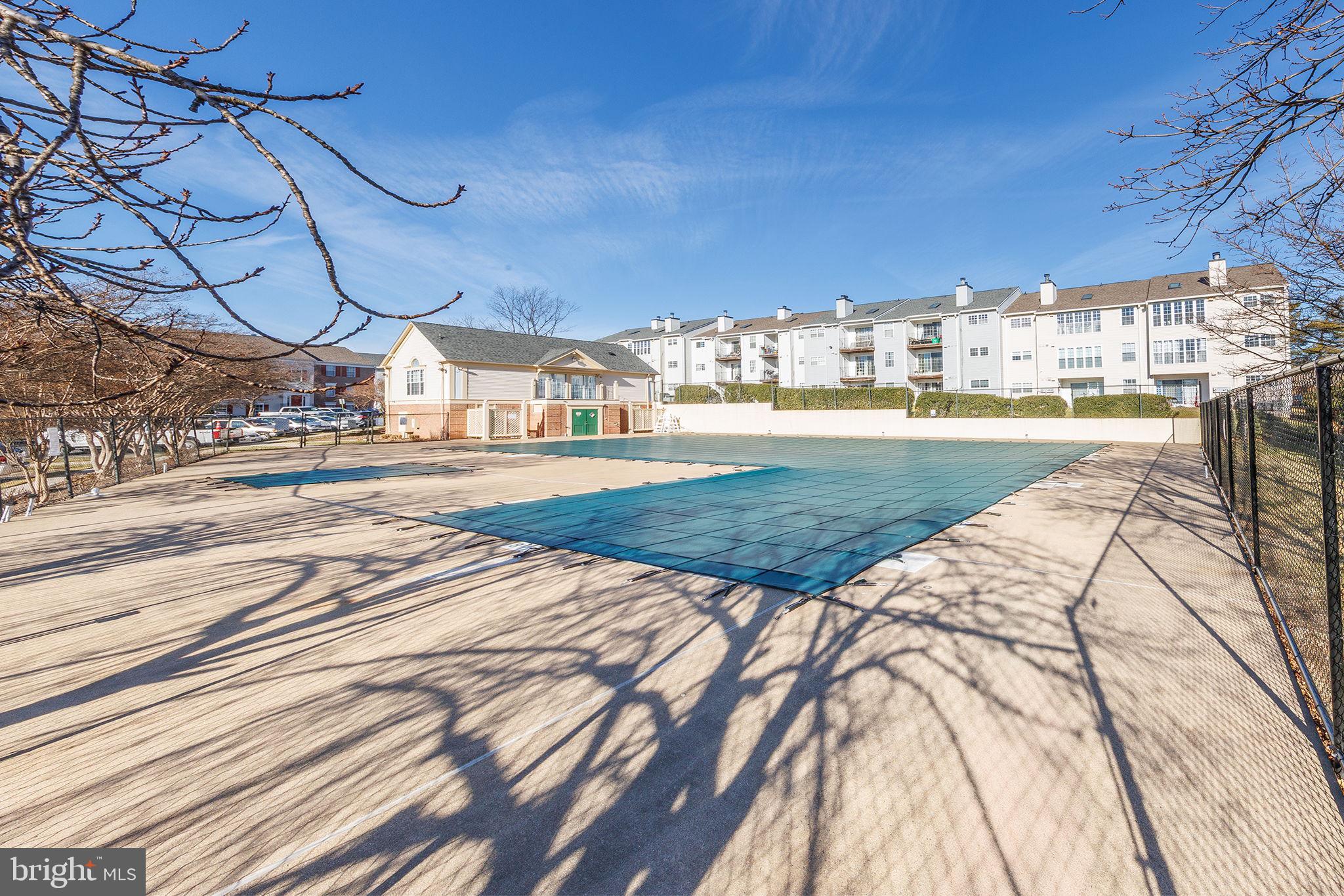 118 Fort Evans Road Southeast, Unit C Leesburg, VA 20175 - Photo 34 of 35 a view of a swimming pool and outdoor space