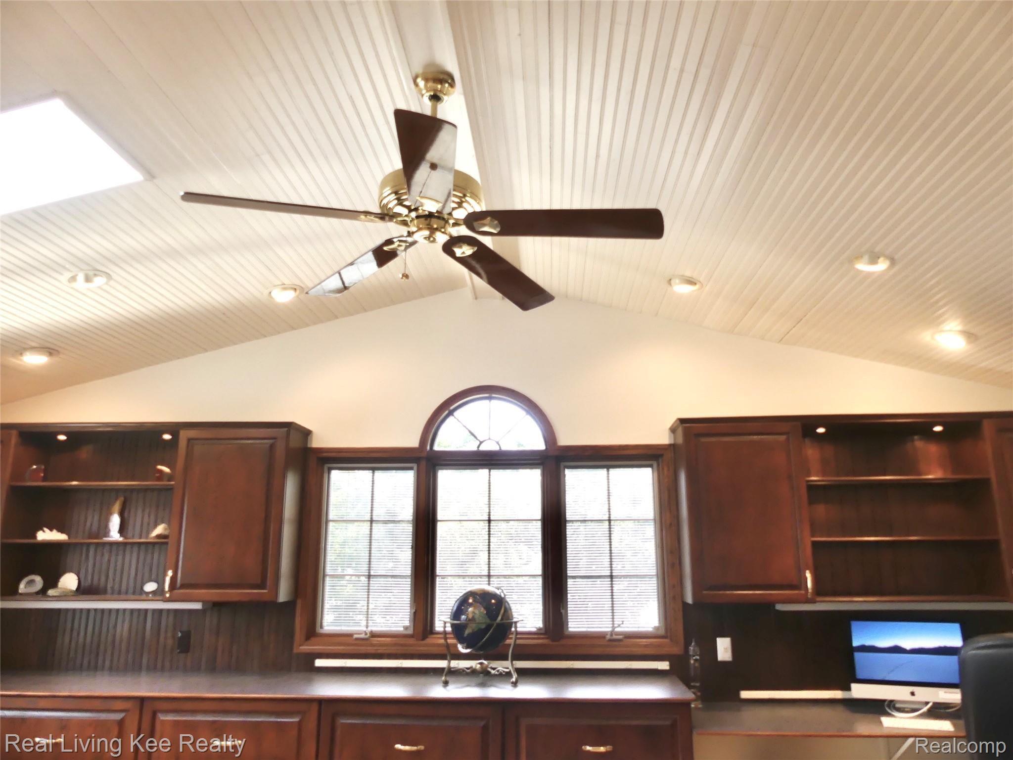 67 Cedarwald Drive Rochester, MI 48306 - Photo 14 of 49 Cathedral wood ceiling plus skylight in library