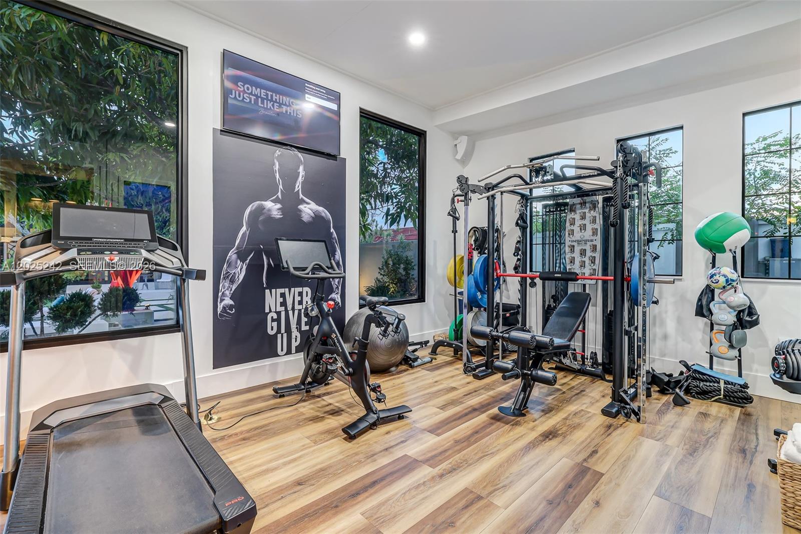 8761 Southwest 56th Street Miami, FL 33165 - Photo 85 of 90 a view of a room with gym equipment