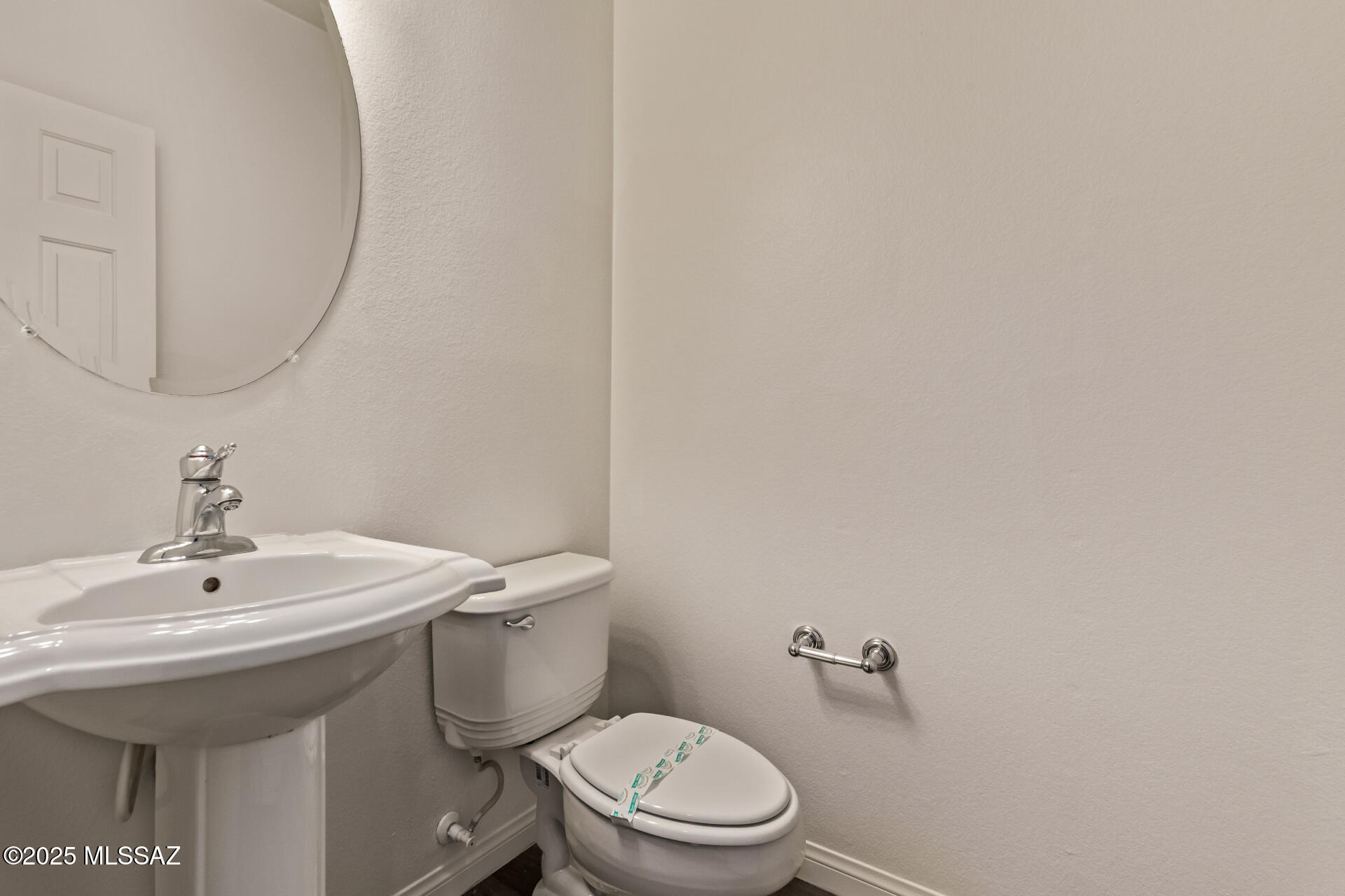 20950 East Frontier Road Red Rock, AZ 85145 - Photo 21 of 44 a bathroom with a sink a toilet and a mirror