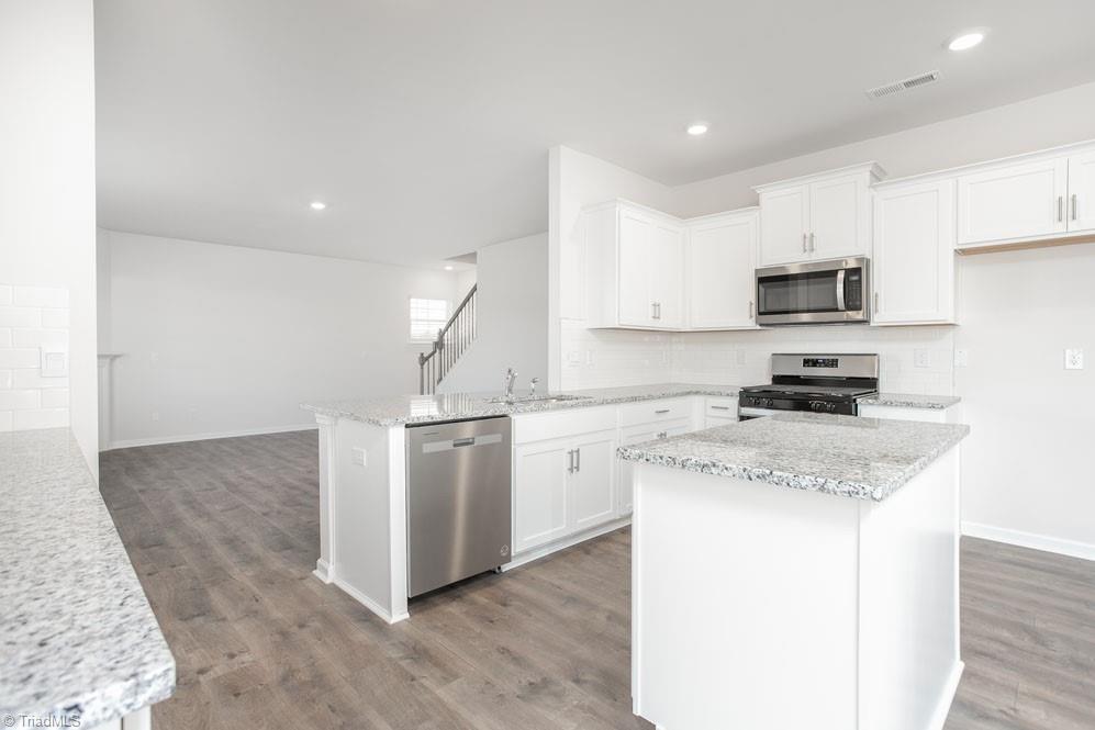 185 Pepper Tree Road Stokesdale, NC 27357 - Photo 13 of 30 The home model is a representative of its residential design