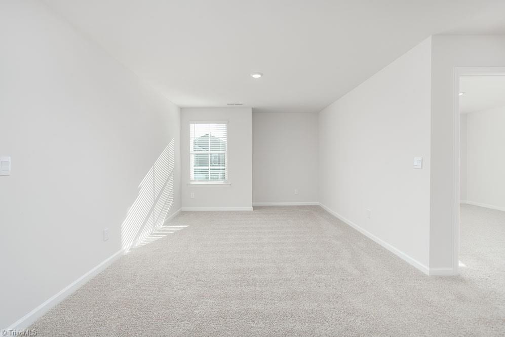 185 Pepper Tree Road Stokesdale, NC 27357 - Photo 17 of 30 The home model is a representative of its residential design