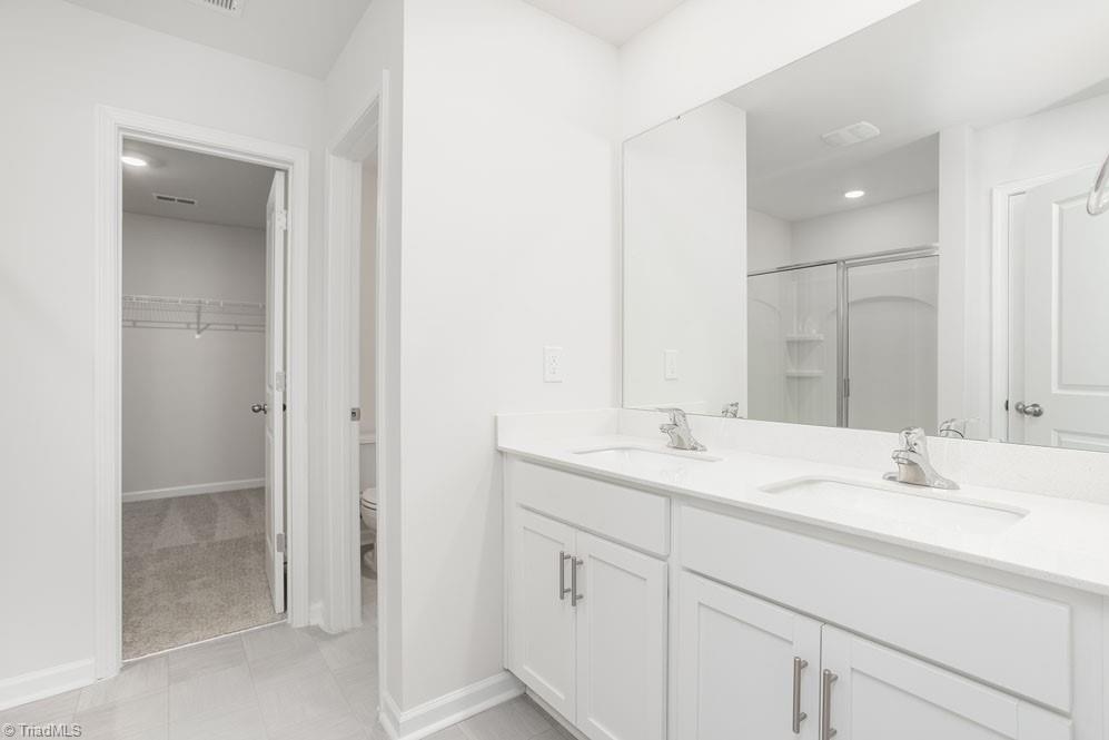 185 Pepper Tree Road Stokesdale, NC 27357 - Photo 21 of 30 The home model is a representative of its residential design