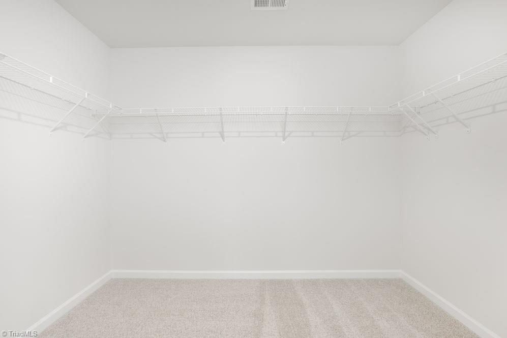 185 Pepper Tree Road Stokesdale, NC 27357 - Photo 23 of 30 The home model is a representative of its residential design