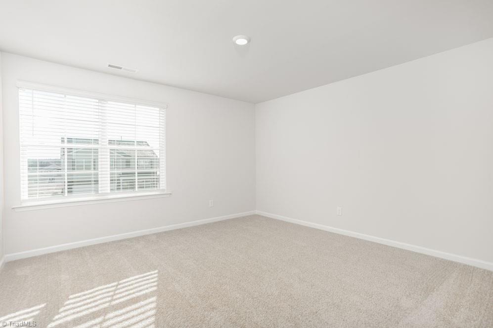 185 Pepper Tree Road Stokesdale, NC 27357 - Photo 26 of 30 The home model is a representative of its residential design