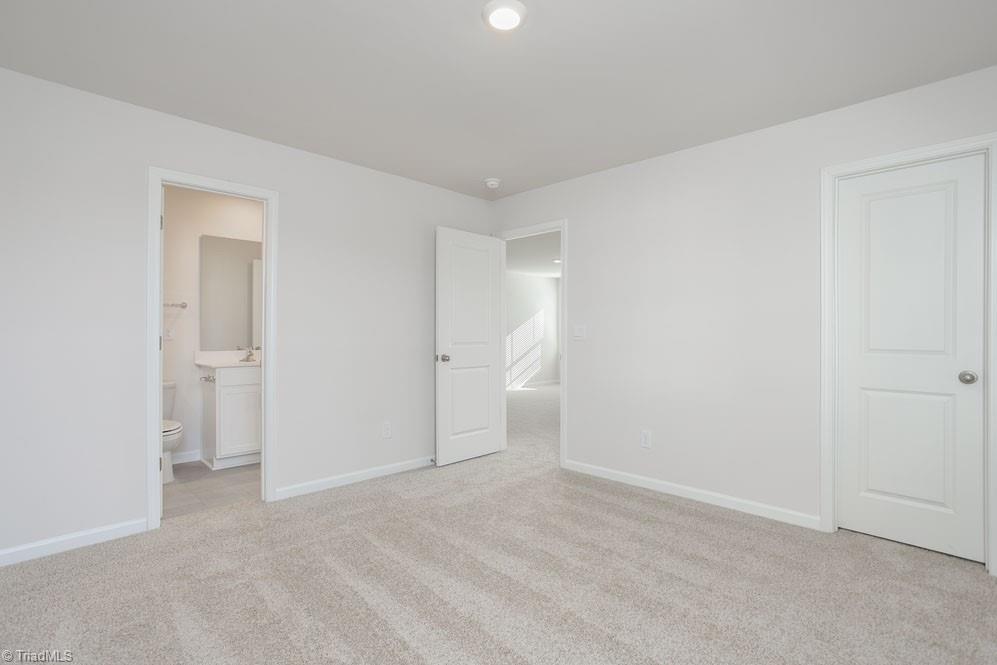 185 Pepper Tree Road Stokesdale, NC 27357 - Photo 30 of 30 The home model is a representative of its residential design