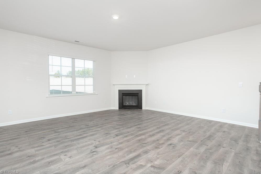 185 Pepper Tree Road Stokesdale, NC 27357 - Photo 8 of 30 The home model is a representative of its residential design