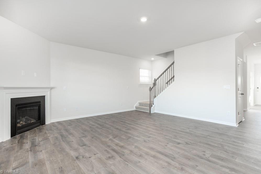 185 Pepper Tree Road Stokesdale, NC 27357 - Photo 9 of 30 The home model is a representative of its residential design