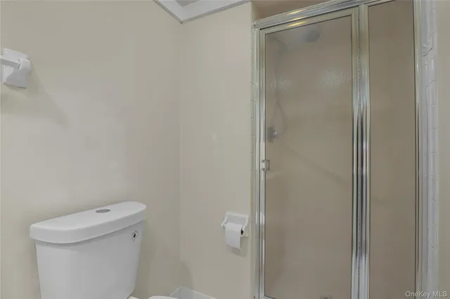 a backyard of a house with large trees