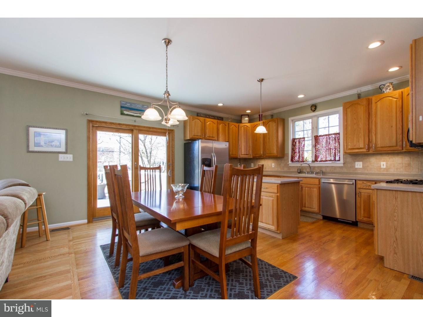 1728 Ridgeway Road Havertown, PA 19083 - Photo 12 of 25 a view of a dining room with furniture window and wooden floor