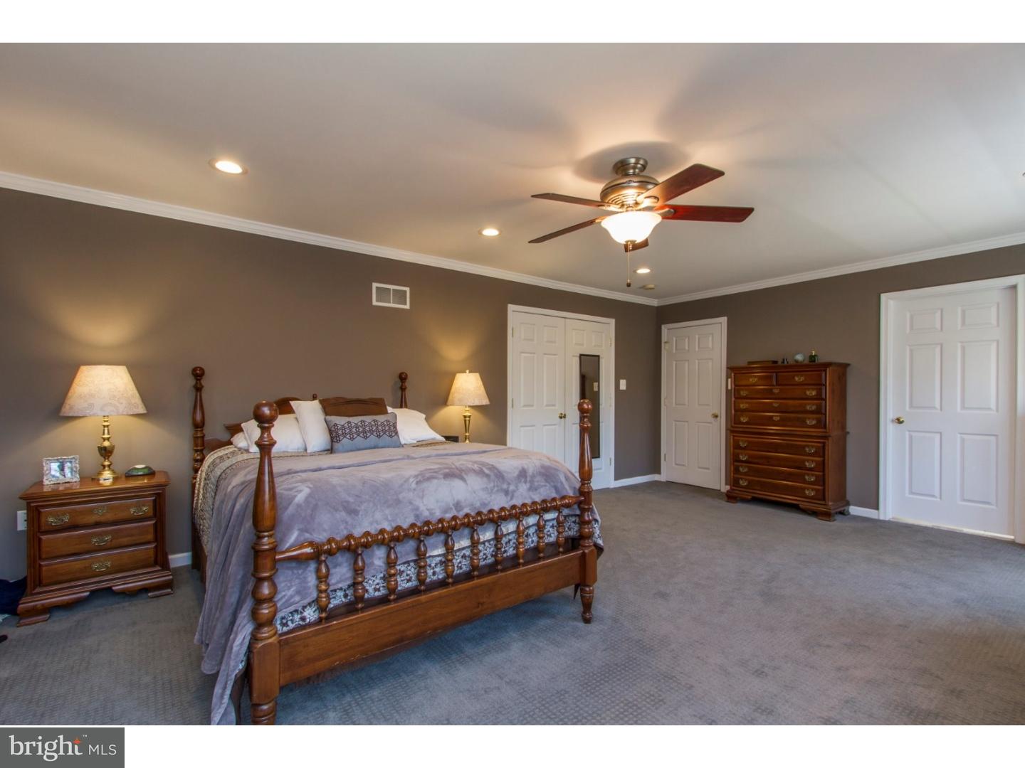 1728 Ridgeway Road Havertown, PA 19083 - Photo 17 of 25 a bedroom with a bed and a ceiling fan