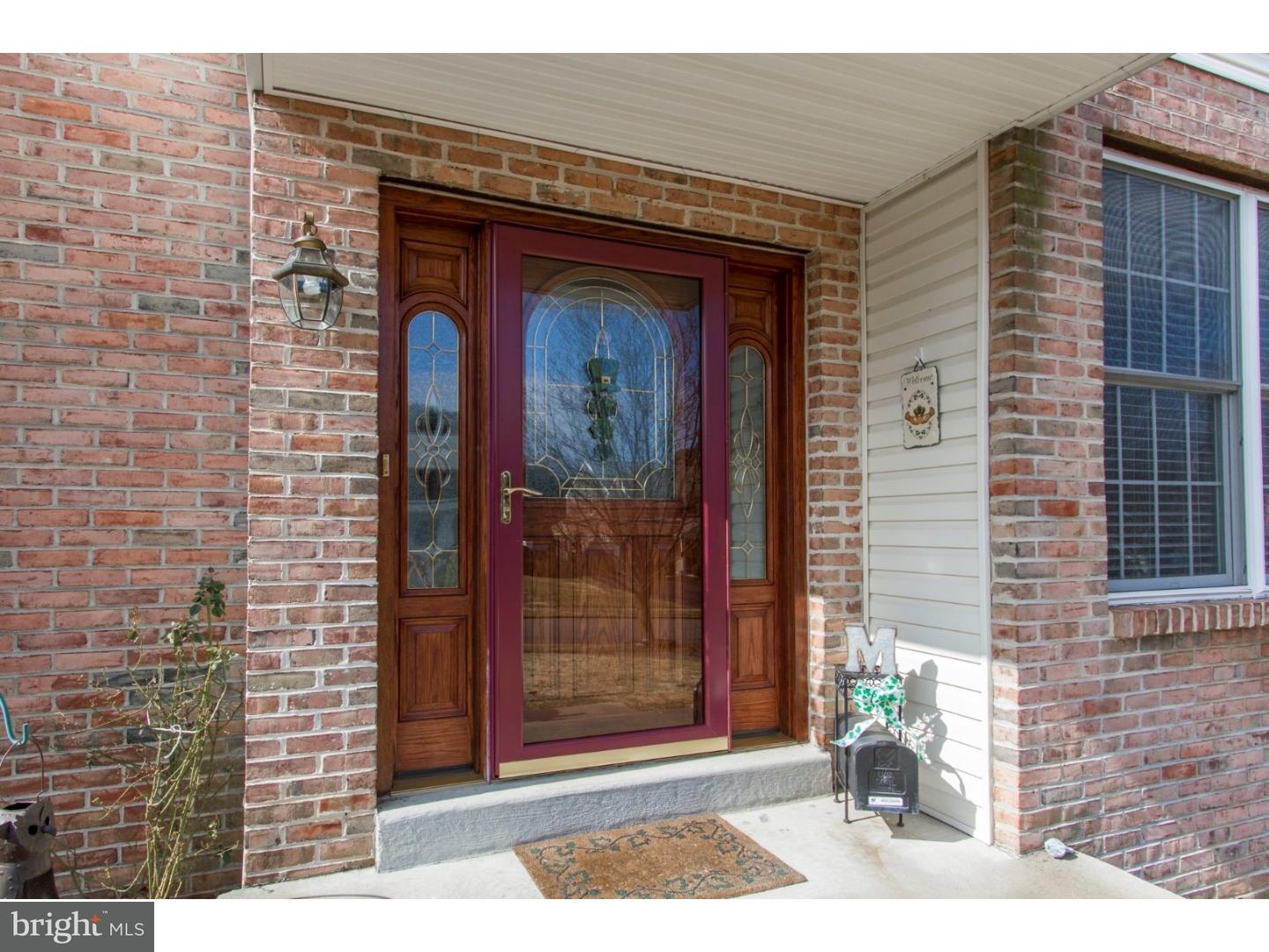 1728 Ridgeway Road Havertown, PA 19083 - Photo 3 of 25 a front view of a house with a