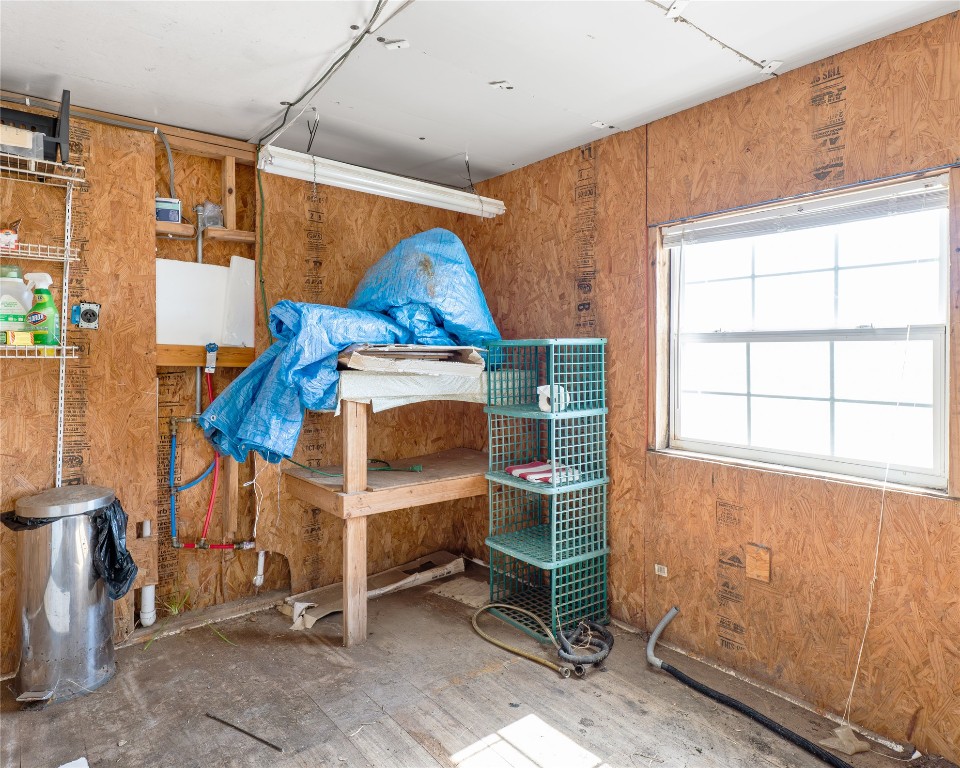 14507 Chimaera Road Sargent, TX 77414 - Photo 19 of 27 a room with furniture and a window