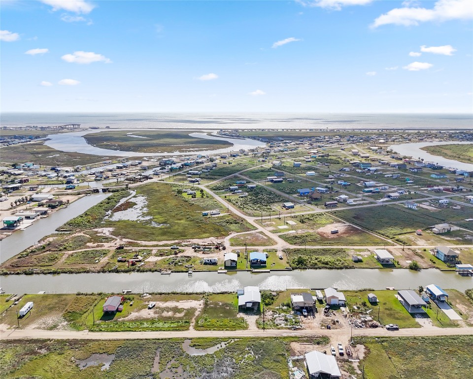 14507 Chimaera Road Sargent, TX 77414 - Photo 6 of 27 an aerial view of residential building and ocean