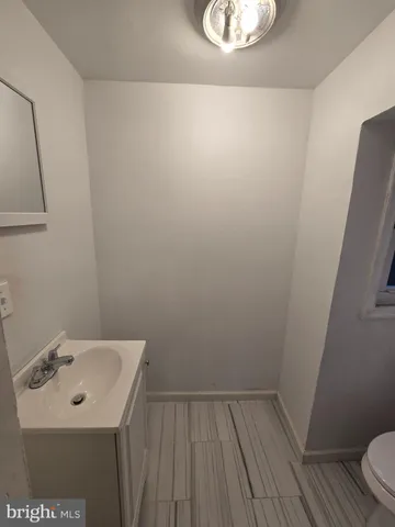 a bathroom with a sink and a toilet