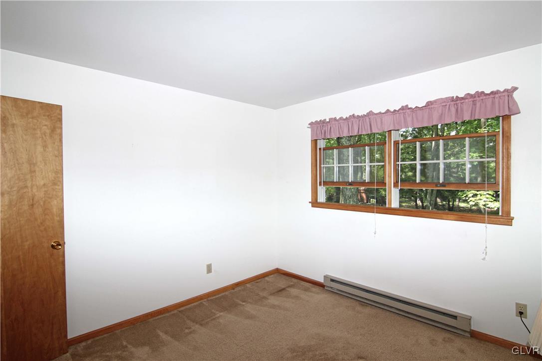 3246 Willow Grove Road Pocono Summit, PA 18346 - Photo 17 of 30 an empty room with window