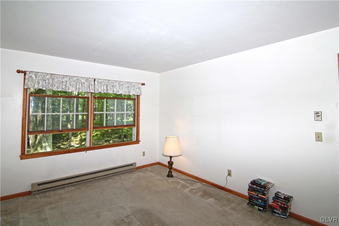3246 Willow Grove Road Pocono Summit, PA 18346 - Photo 18 of 30 a room with a window