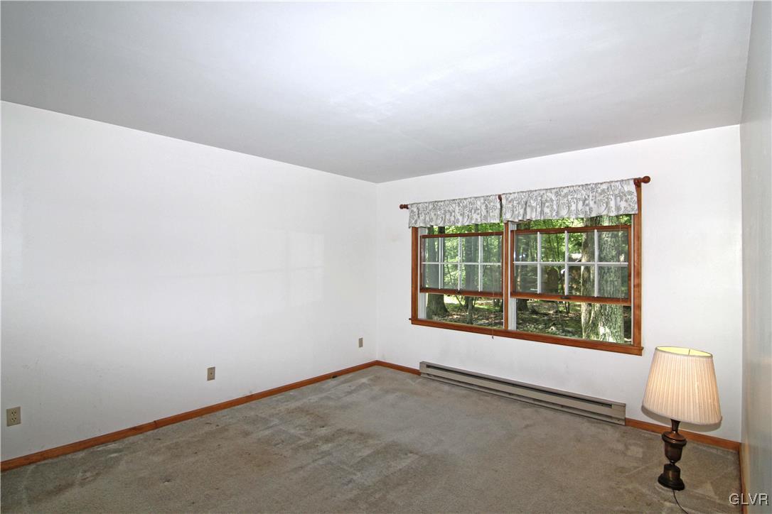 3246 Willow Grove Road Pocono Summit, PA 18346 - Photo 19 of 30 a view of an empty room with a window