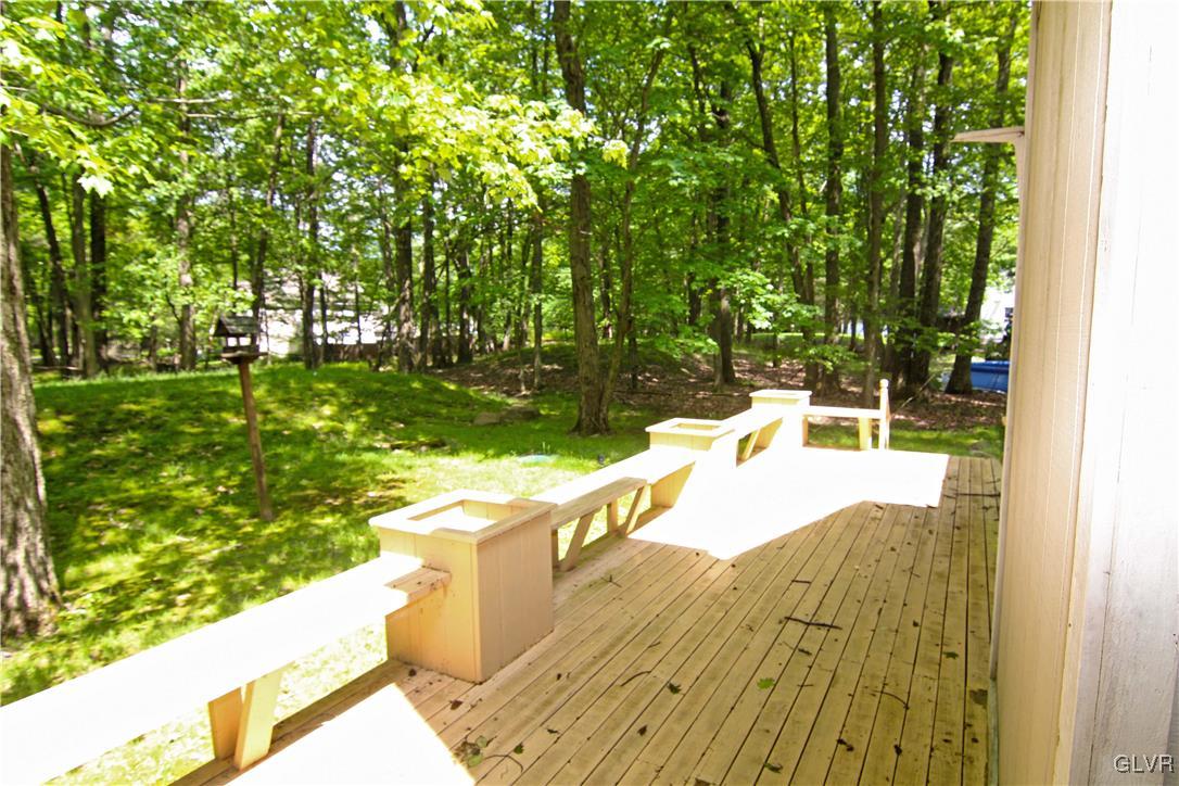 3246 Willow Grove Road Pocono Summit, PA 18346 - Photo 21 of 30 a view of a swimming pool with a patio