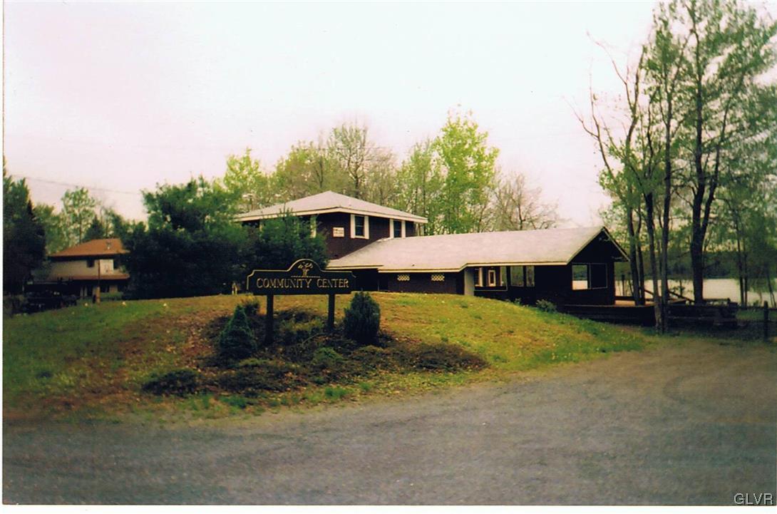 3246 Willow Grove Road Pocono Summit, PA 18346 - Photo 25 of 30 a house with swimming pool in front of it