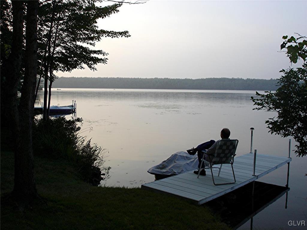 3246 Willow Grove Road Pocono Summit, PA 18346 - Photo 29 of 30 a view of a lake from a balcony