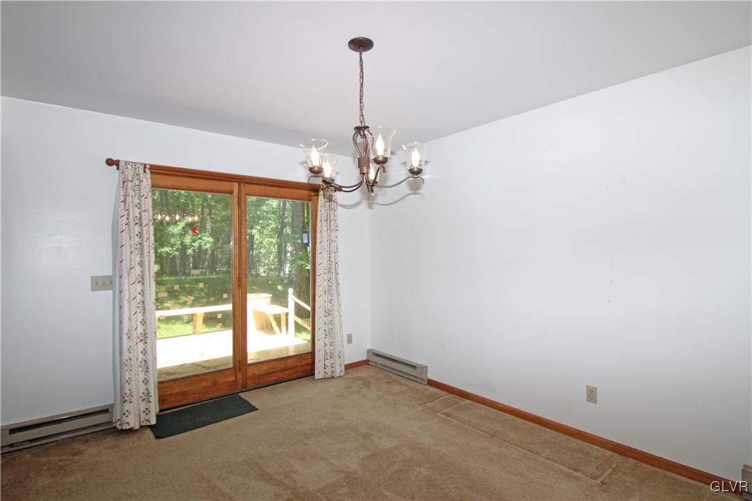 3246 Willow Grove Road Pocono Summit, PA 18346 - Photo 7 of 30 a view of a room with a large window