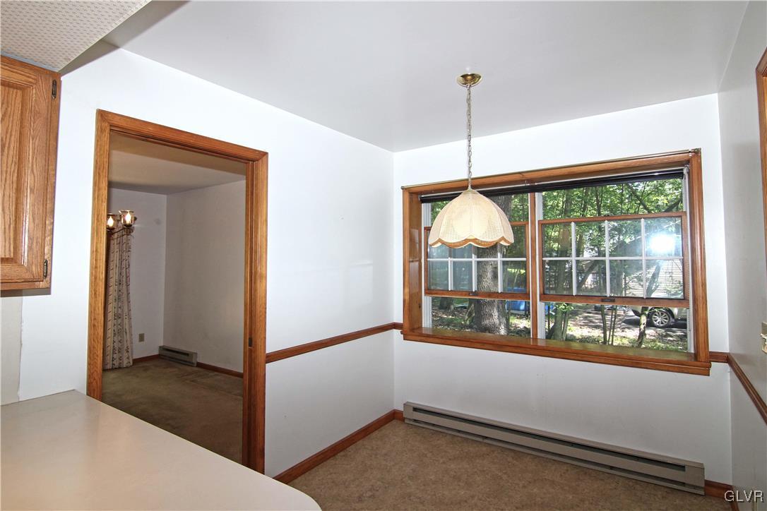 3246 Willow Grove Road Pocono Summit, PA 18346 - Photo 9 of 30 a view of room with window and ceiling fan