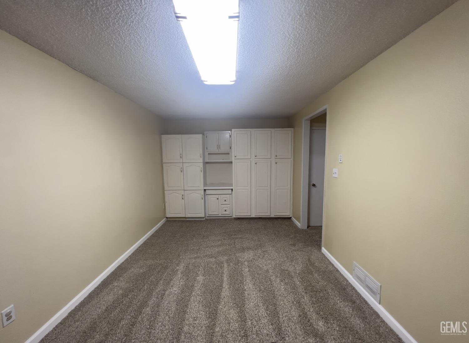 Undisclosed Address Buttonwillow, CA 93206 - Photo 11 of 24 a view of a closet in a room