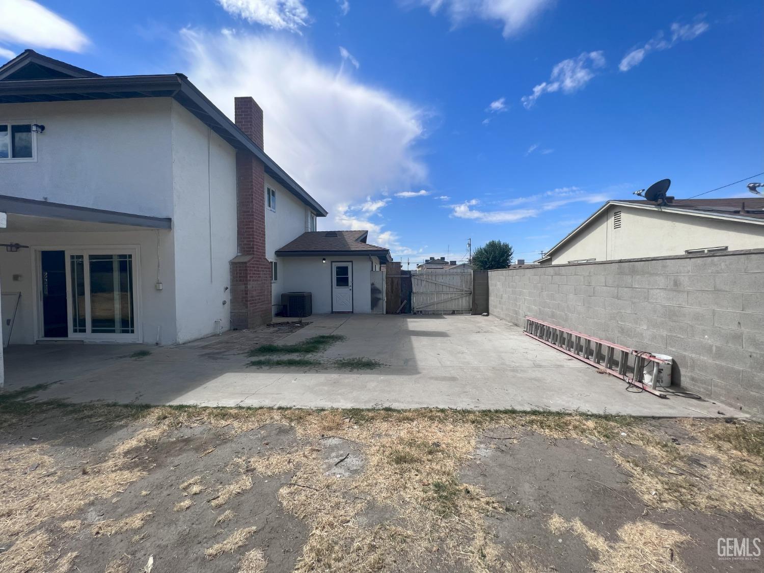 Undisclosed Address Buttonwillow, CA 93206 - Photo 24 of 24 a view of a house with a patio