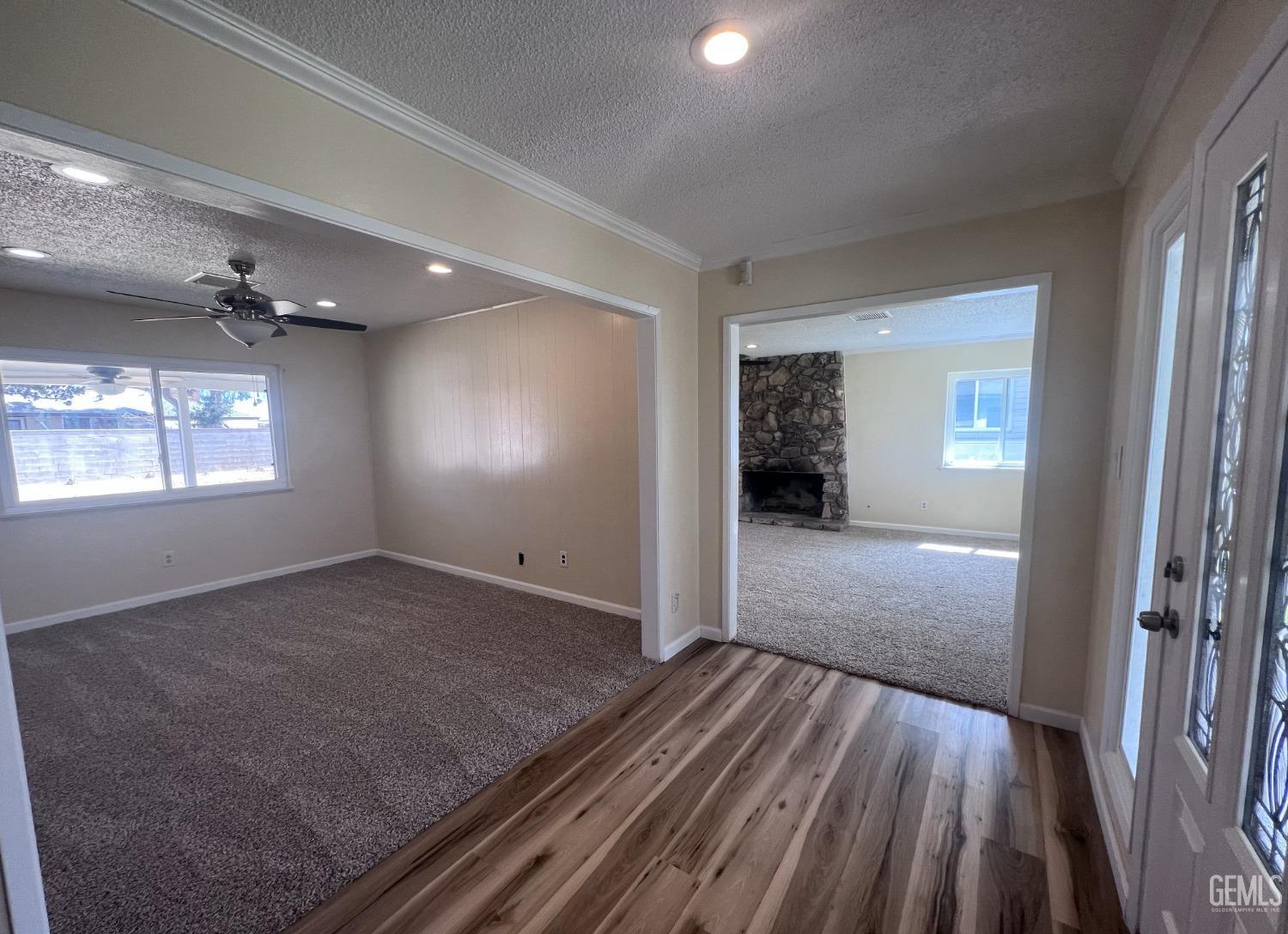 Undisclosed Address Buttonwillow, CA 93206 - Photo 3 of 24 wooden floor in an empty room with a window
