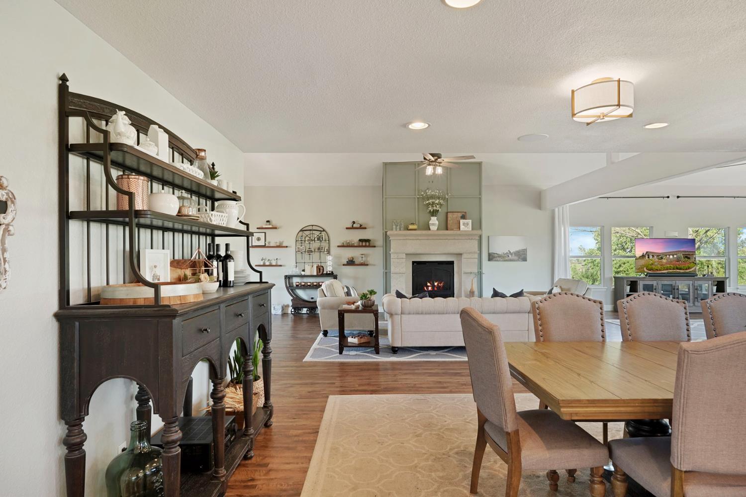 20820 East Acampo Road Clements, CA 95227 - Photo 11 of 28 a living room with fireplace furniture and a flat screen tv