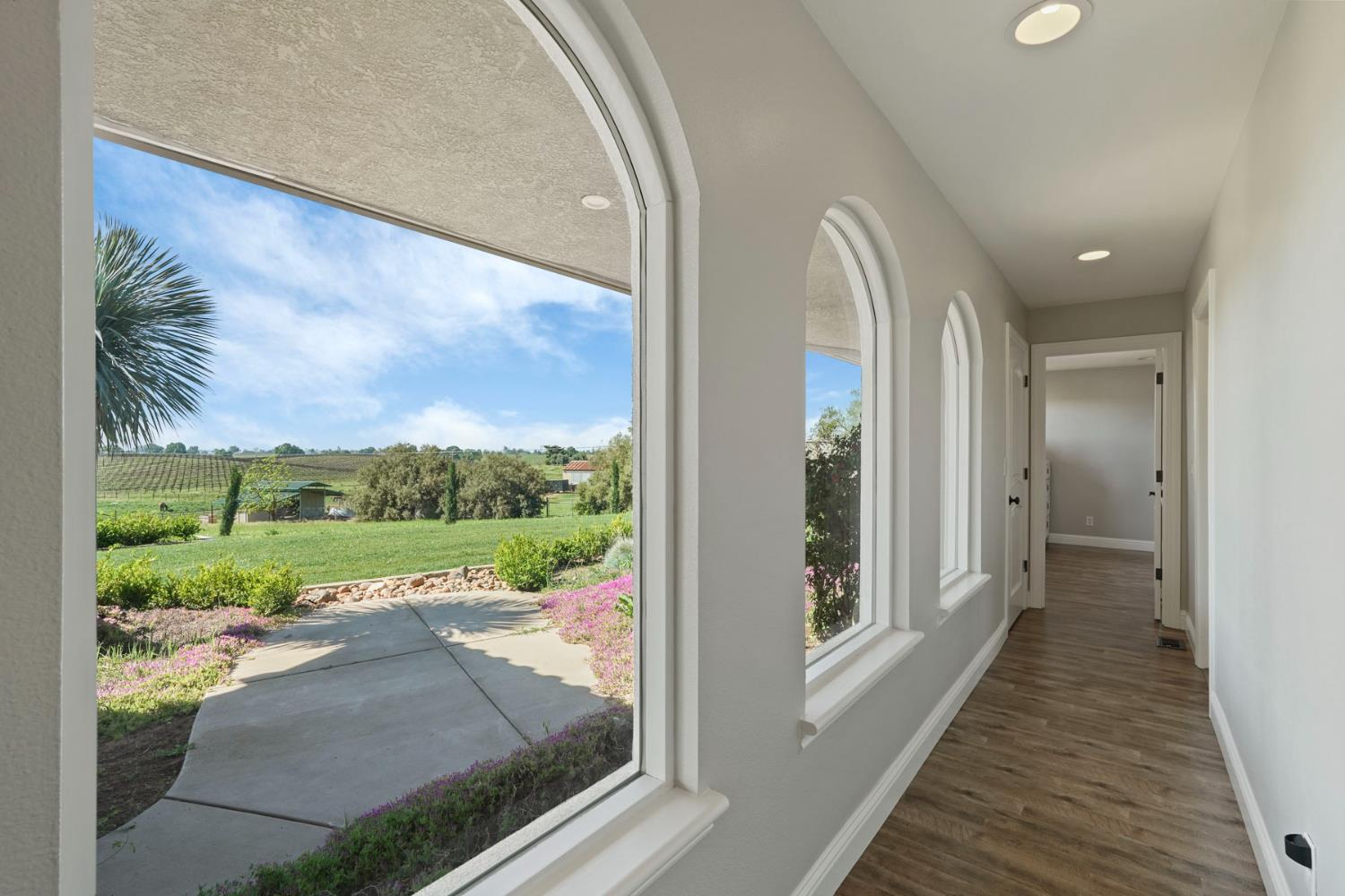20820 East Acampo Road Clements, CA 95227 - Photo 16 of 28 a view of a balcony from a hallway