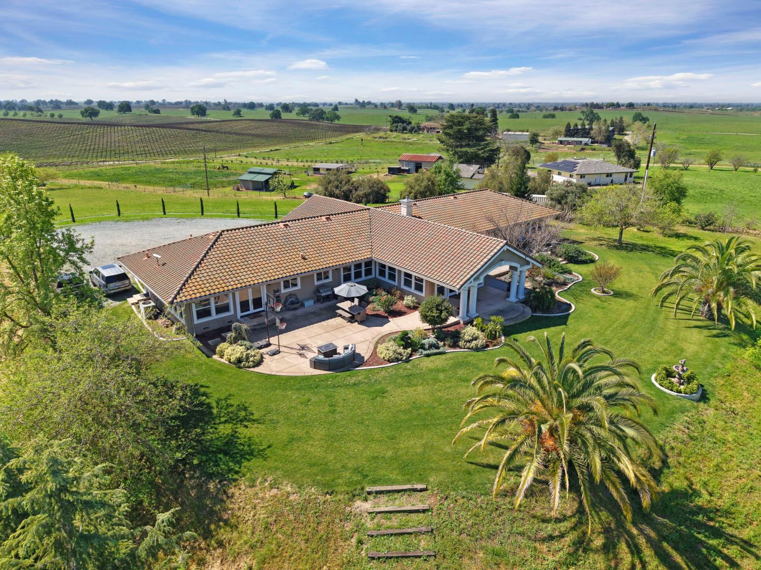 20820 East Acampo Road Clements, CA 95227 - Photo 3 of 28 an aerial view of a house with big yard