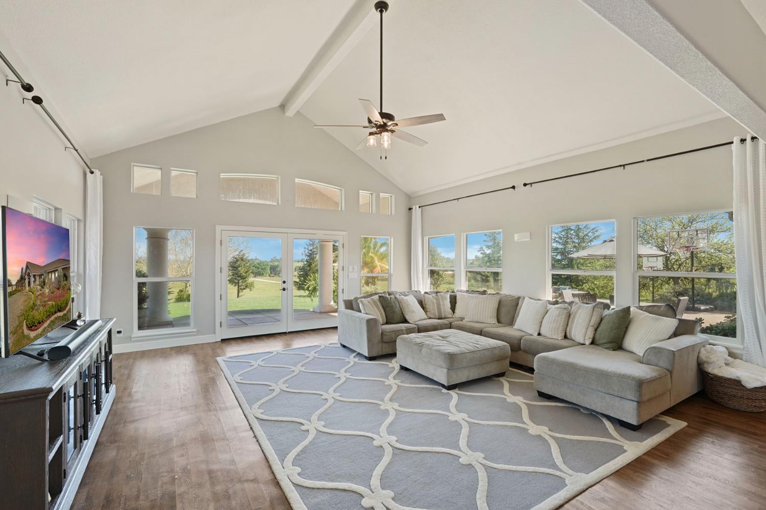 20820 East Acampo Road Clements, CA 95227 - Photo 10 of 28 a living room with patio furniture and a flat screen tv