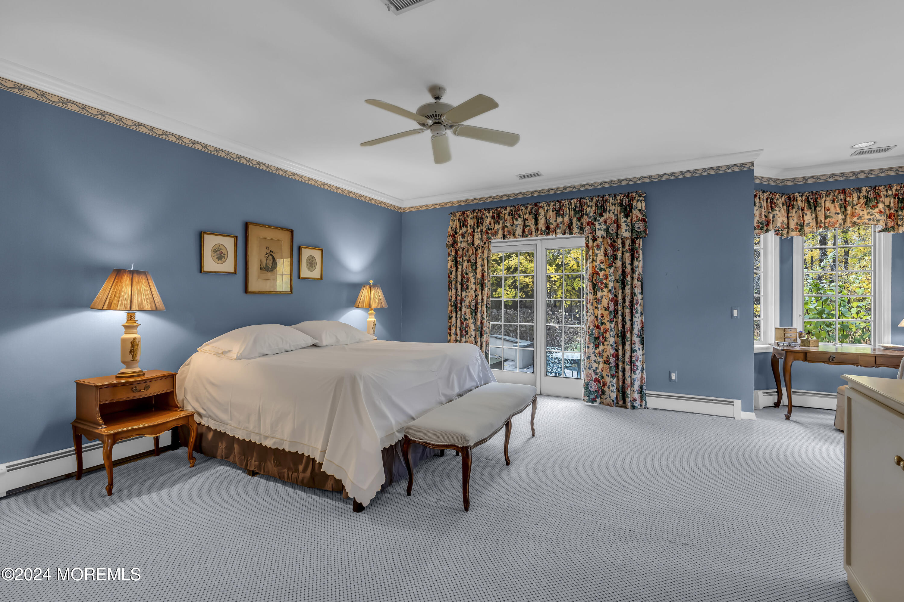 34 Bruns Road West Allenhurst, NJ 07711 - Photo 26 of 90 a bedroom with a bed and a large window