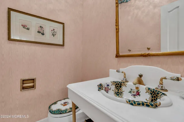 a bedroom with a bed and a chair