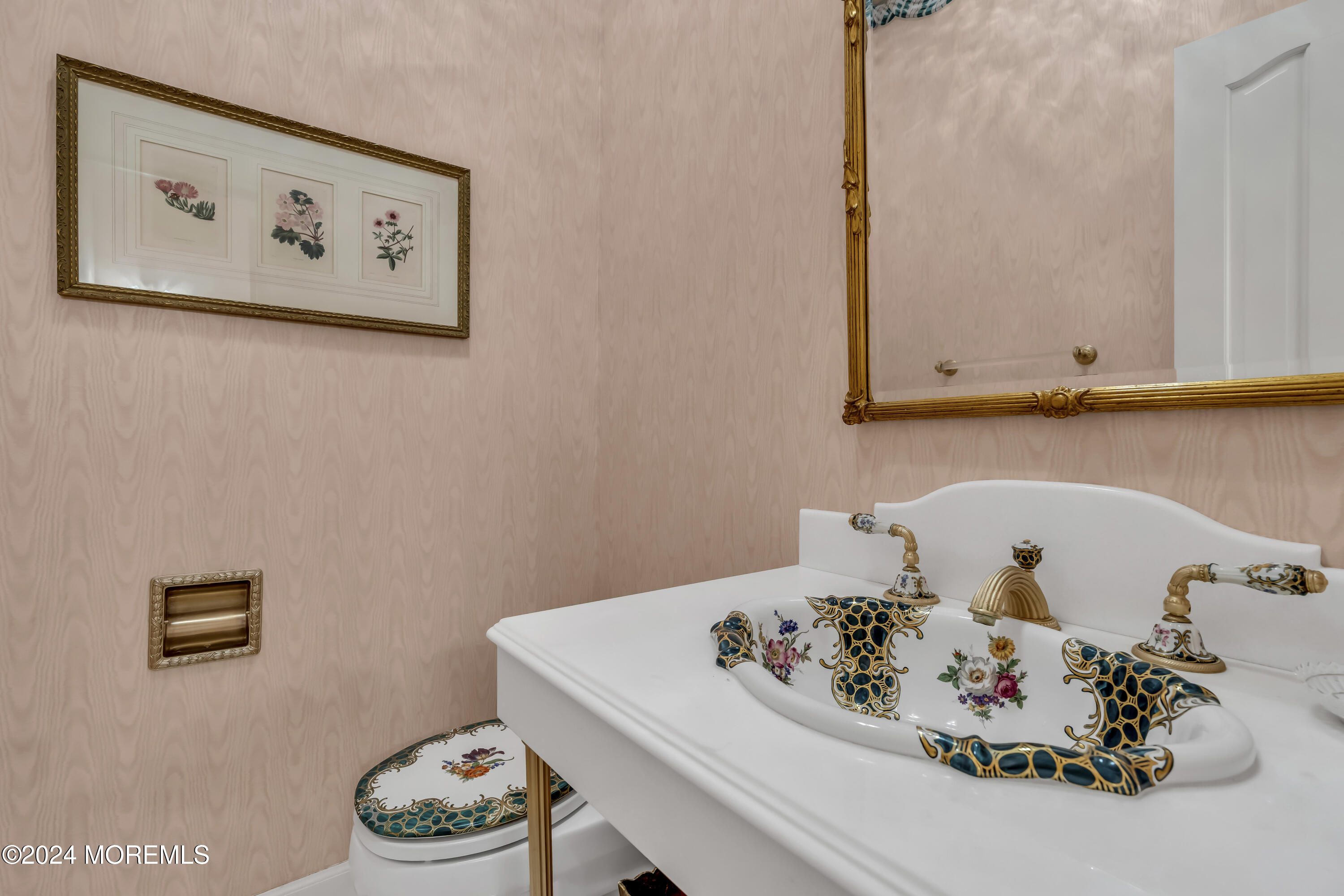 34 Bruns Road West Allenhurst, NJ 07711 - Photo 35 of 90 a bathroom with a sink a vanity and a mirror