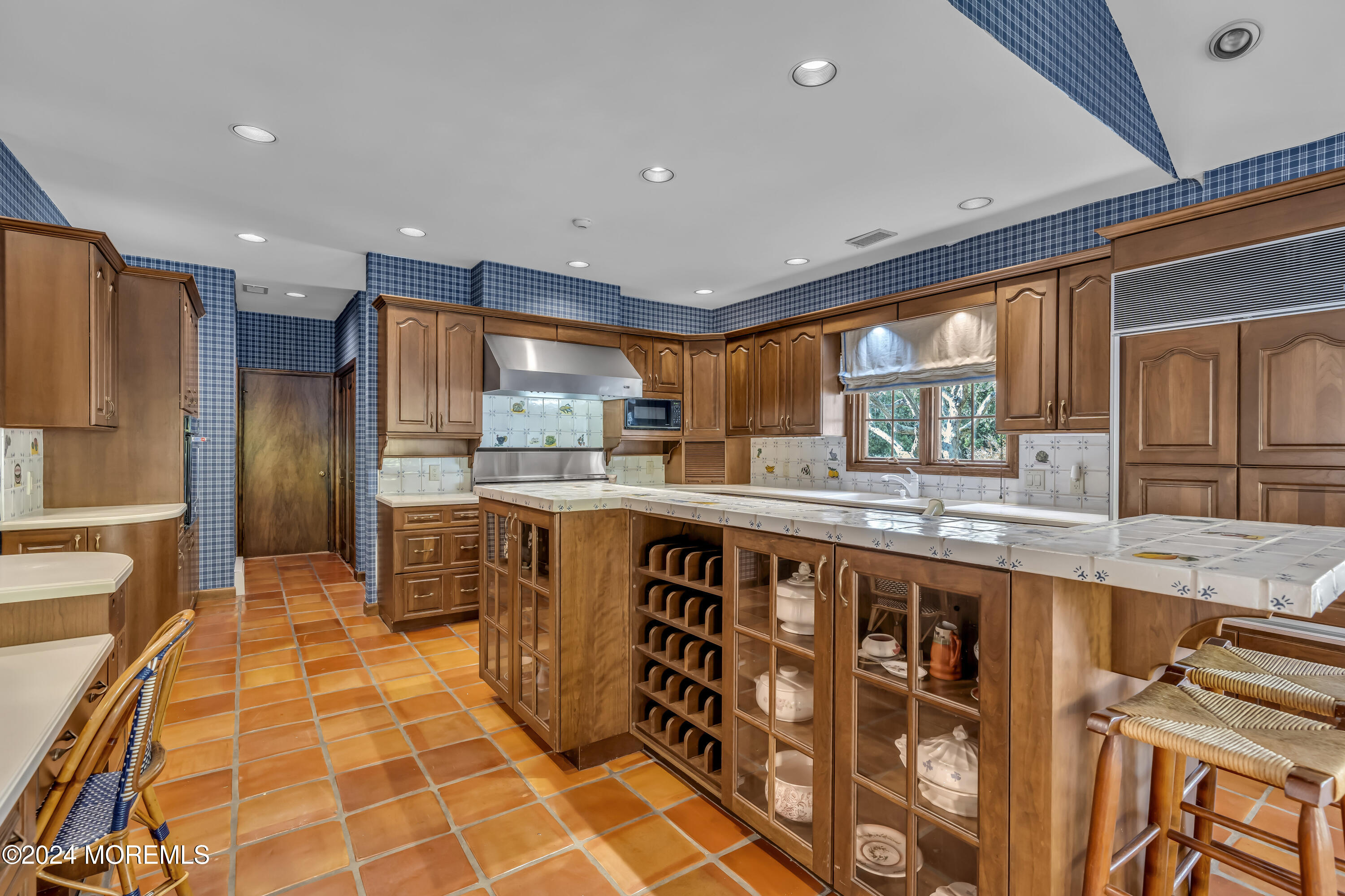 34 Bruns Road West Allenhurst, NJ 07711 - Photo 40 of 90 a kitchen with stainless steel appliances a sink and cabinets
