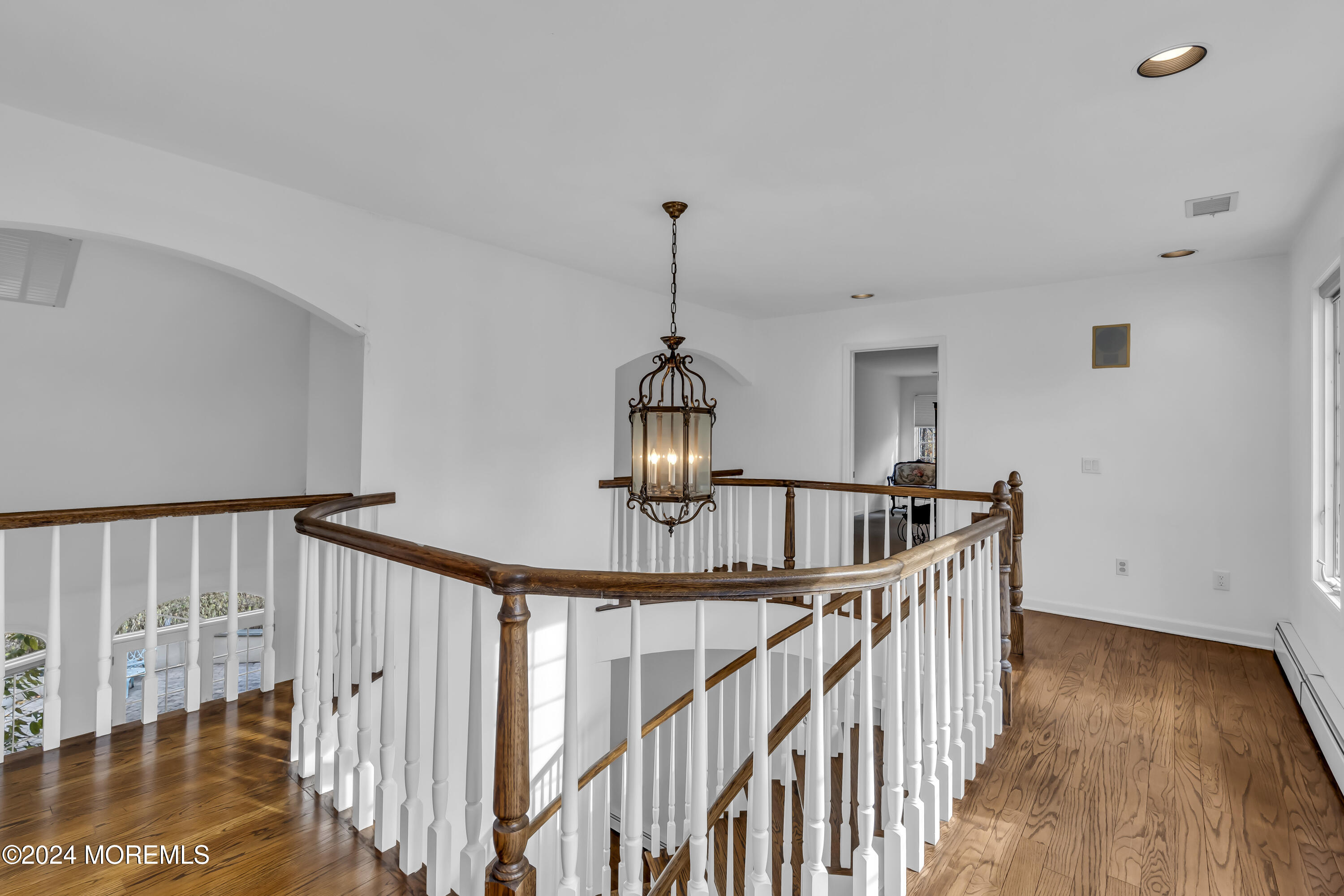 34 Bruns Road West Allenhurst, NJ 07711 - Photo 50 of 90 a view of staircase with wooden floor and white walls