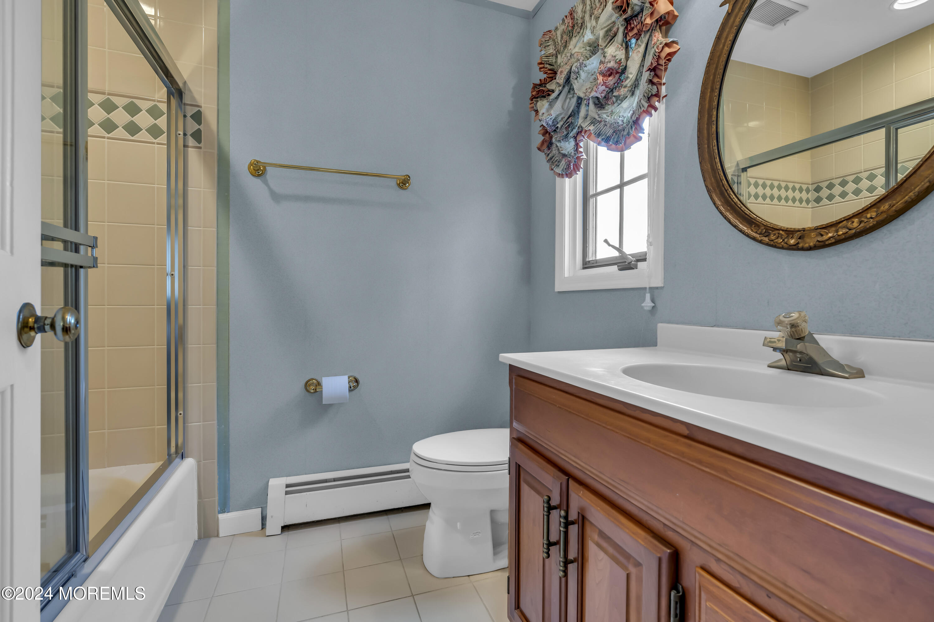 34 Bruns Road West Allenhurst, NJ 07711 - Photo 59 of 90 a bathroom with a sink a toilet and mirror