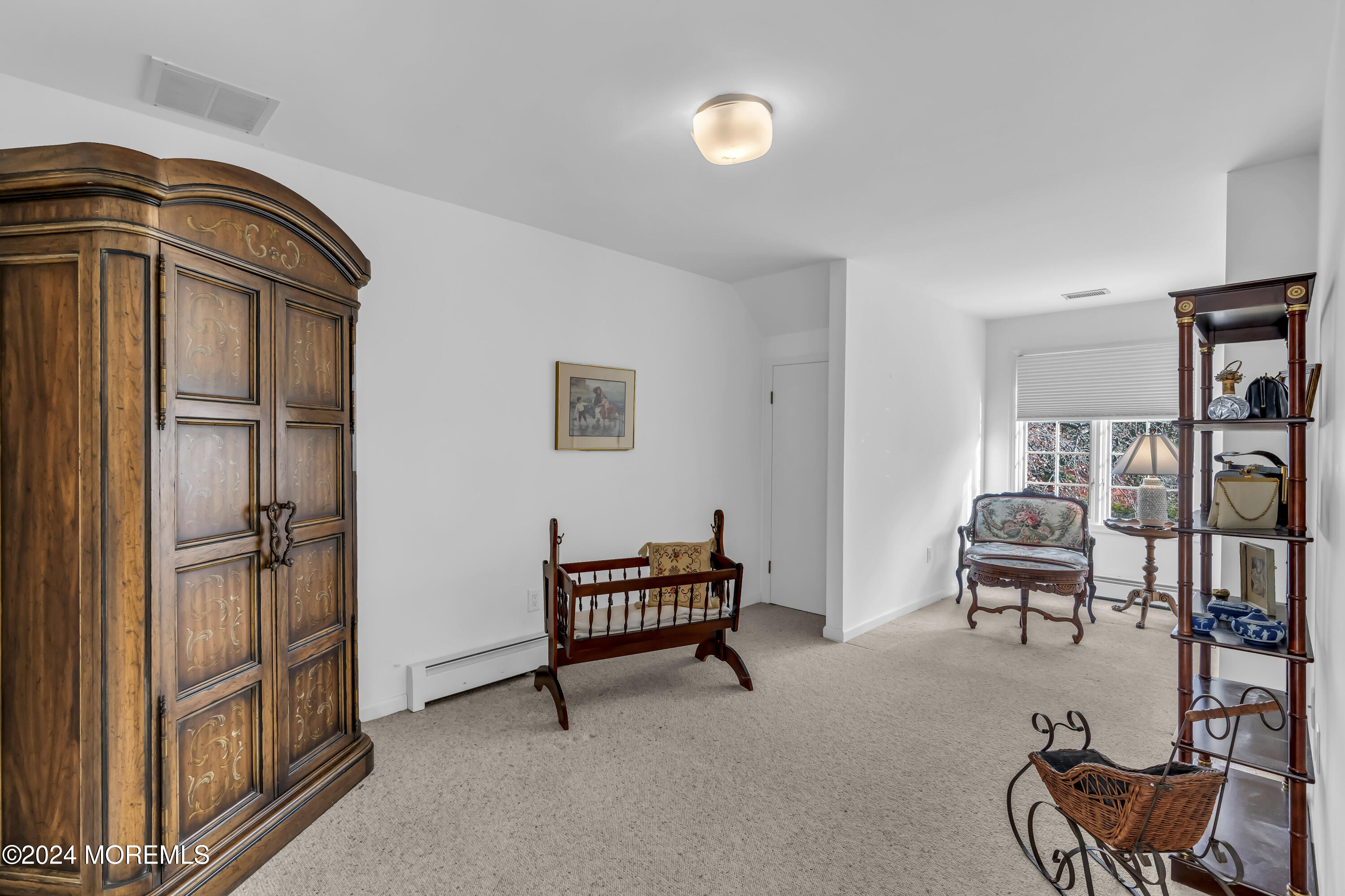 34 Bruns Road West Allenhurst, NJ 07711 - Photo 63 of 90 a bedroom with furniture and a window