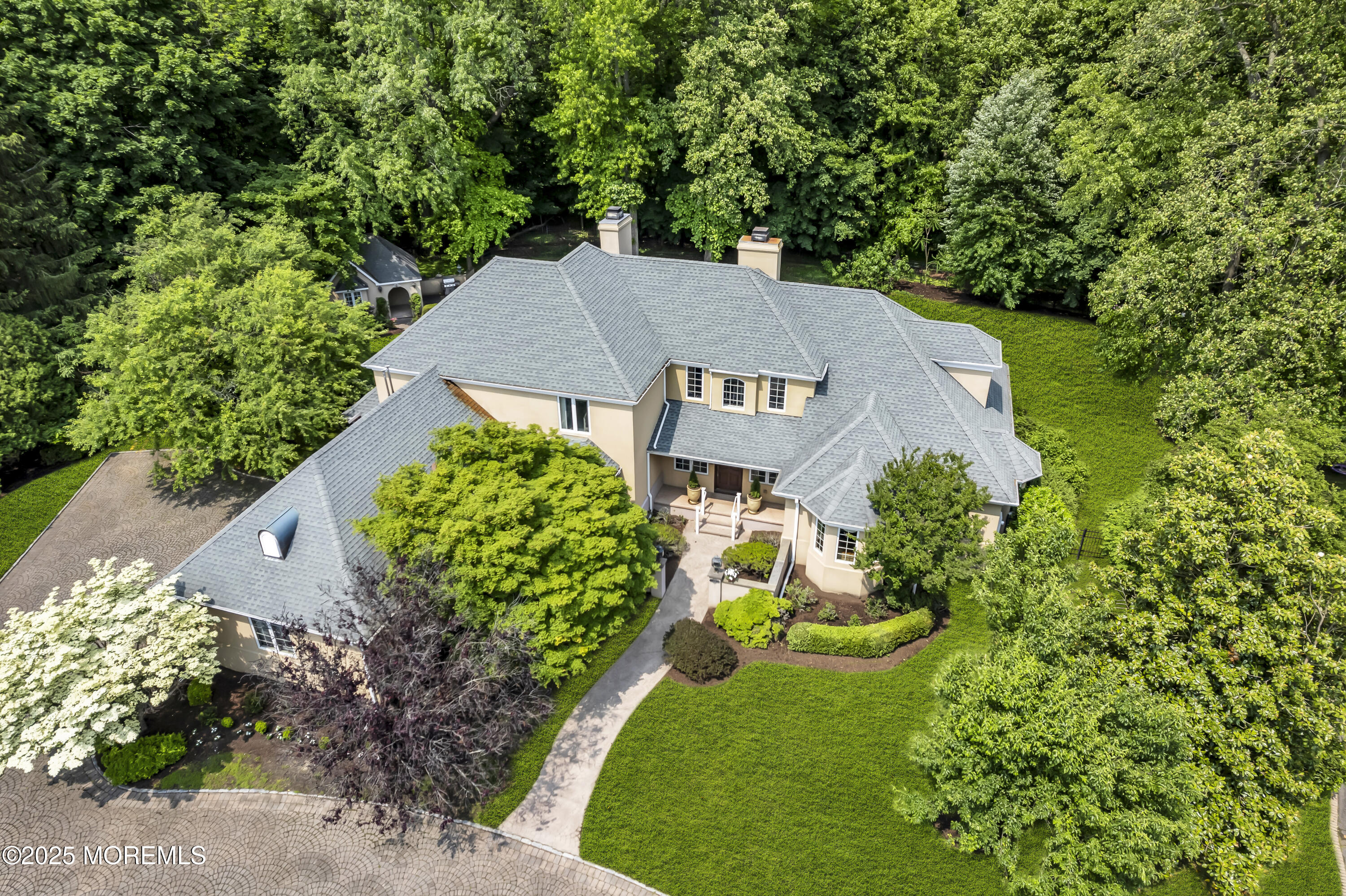 34 Bruns Road West Allenhurst, NJ 07711 - Photo 7 of 90 a view of a house with a yard and garden