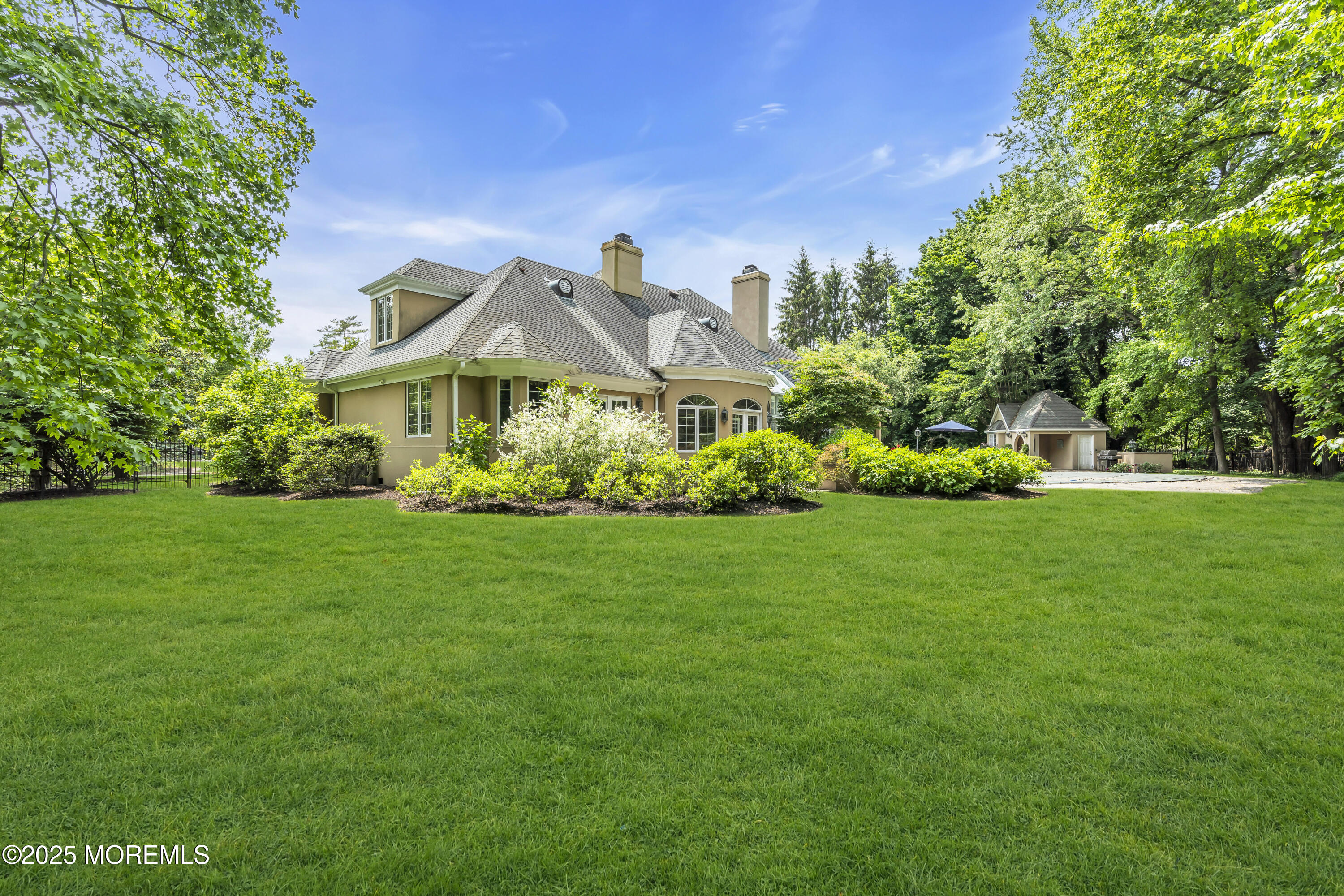 34 Bruns Road West Allenhurst, NJ 07711 - Photo 77 of 90 a front view of a house with a garden