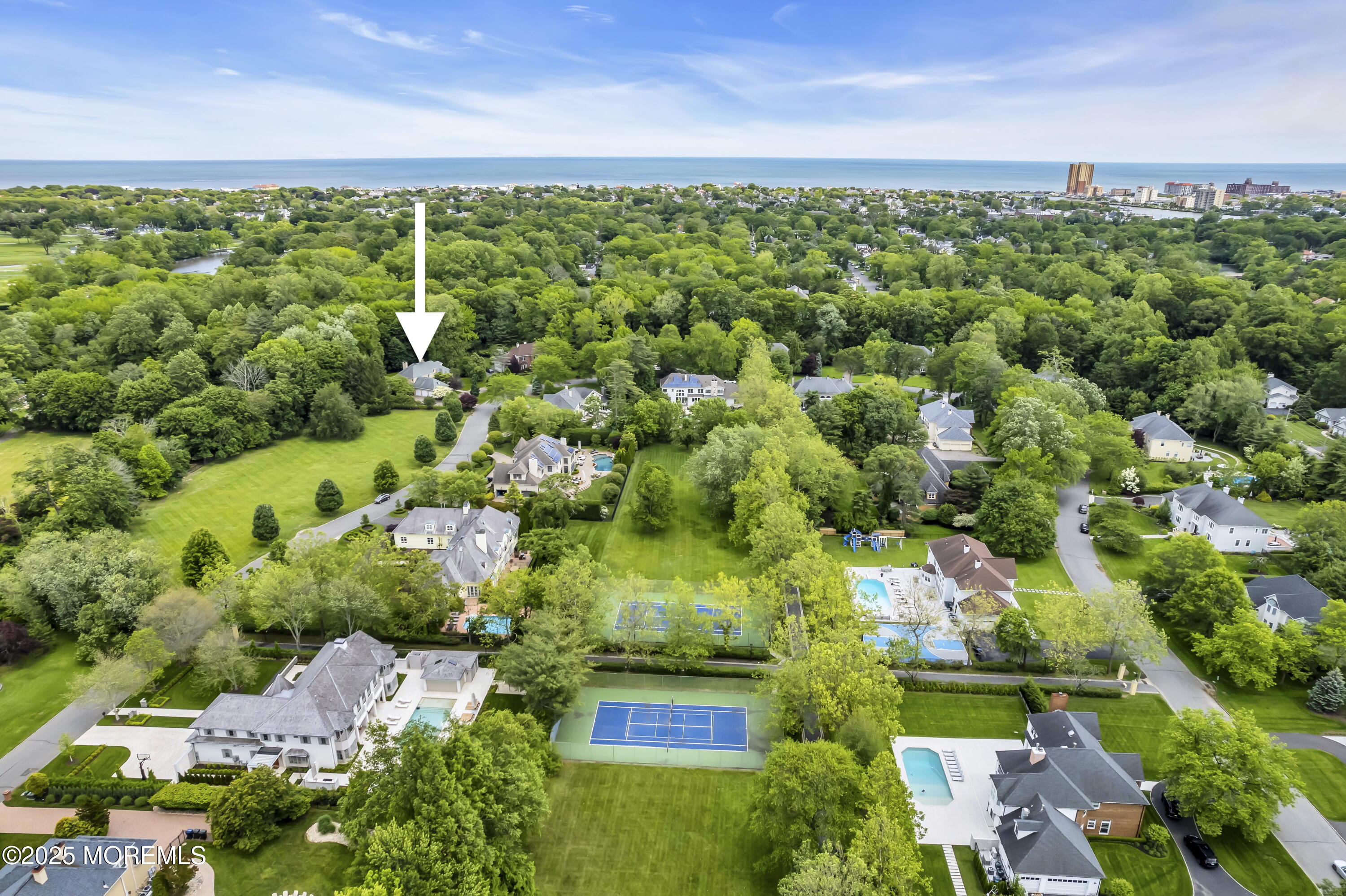 34 Bruns Road West Allenhurst, NJ 07711 - Photo 8 of 90 an aerial view of a houses with outdoor space and trees all around